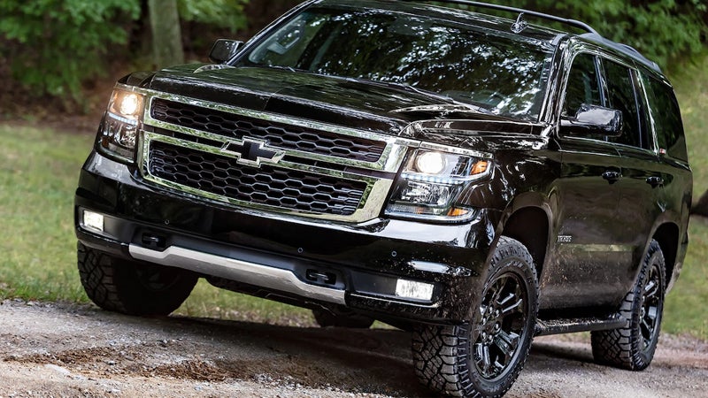 black Chevrolet Tahoe offroading