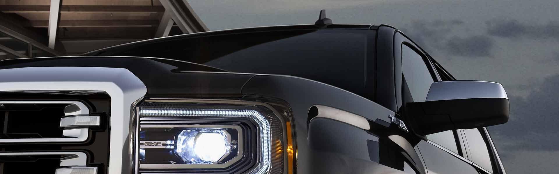 black GMC Sierra 1500 front corner view