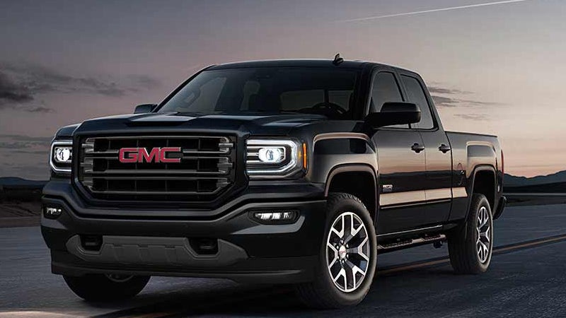 black GMC Sierra 1500 with red logo of GMC